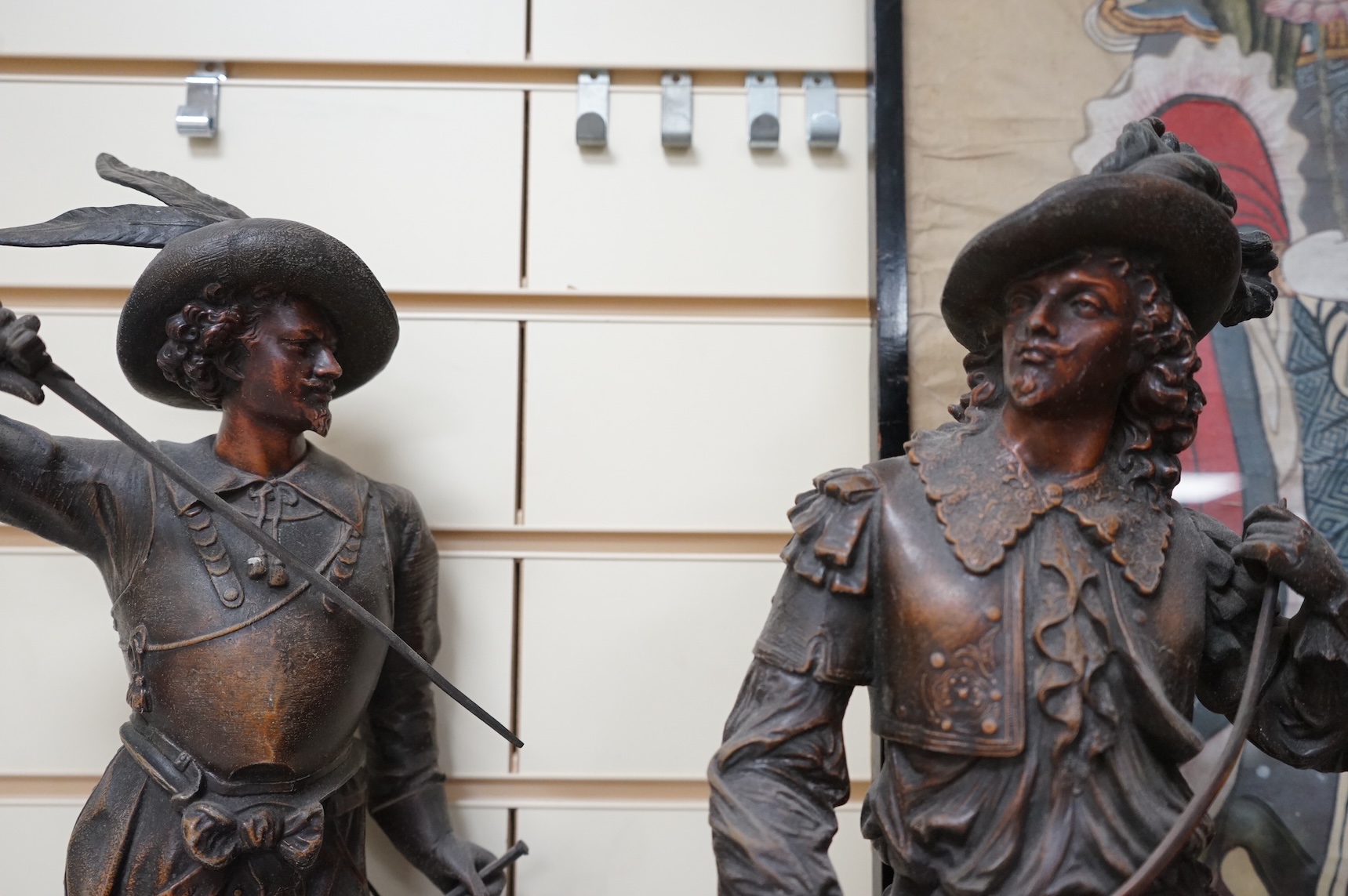 A pair of bronzed spelter figures, another pair of busts and a bronzed spelter group of a Cavalier and his horse, tallest 52cm